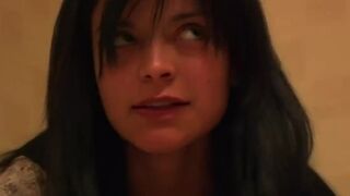 2 beautiful girls pooping in front of a bunch of men