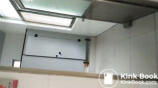 Asian restroom under stall spy