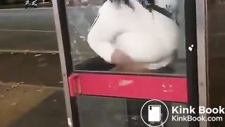 Black woman shit in a phone booth