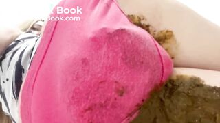 Red panties overflowing with poop