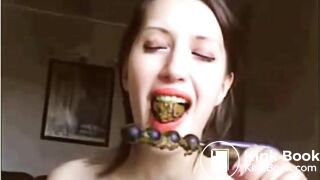 Eating her scat off anal beads