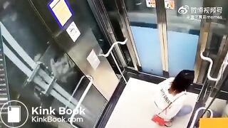 Asian woman shitting in an elevator