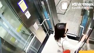 Asian woman shitting in an elevator
