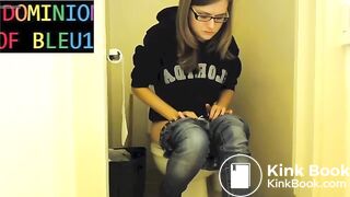 Sexy girl pushing on toilet