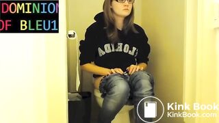Sexy girl pushing on toilet