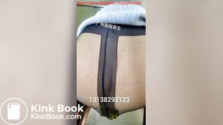Chinese slut fills pantyhose