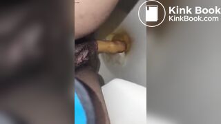 She Poops while on the Toilet