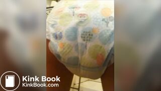 Girl poop in her pampers