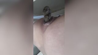 Up close going pee and pooping on the potty