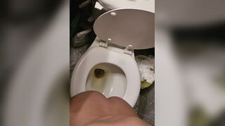 Girl pooping and peeing on toilet