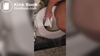 Girl pooping and peeing on toilet