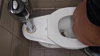 Girl pooping on public toilet - video 5