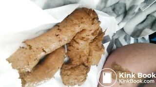 Girl shitting a huge pile in the car