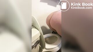 chick shits in bathrooom