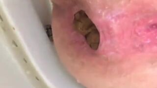 girl Piss and lovely shit in closeup