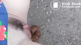She poops on a trail in the woods..