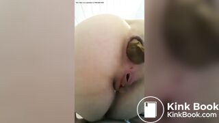 A woman is pooping out.