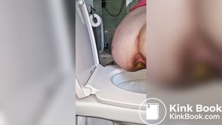 Push out big turd in toilet