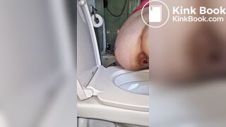 Push out big turd in toilet