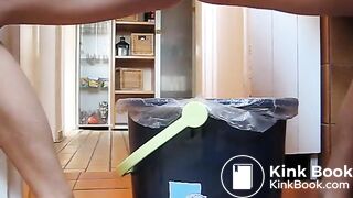 German lady defecates in a trash can..