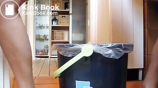 German lady defecates in a trash can..