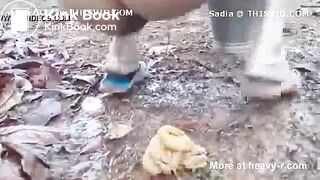 Desi aunty shitting in the open