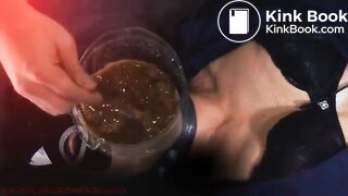 Human toilet swallows piss and shit through a funnel