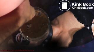 Human toilet swallows piss and shit through a funnel