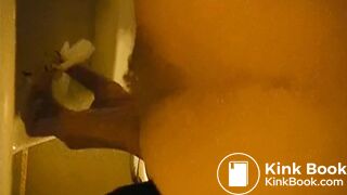 constipation woman pushing finger into her anus