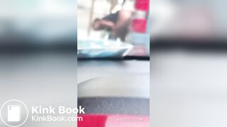 Woman shits on the street.