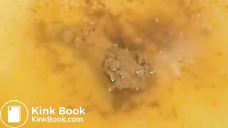 Girl shitting over bathtub