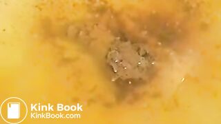 Girl shitting over bathtub