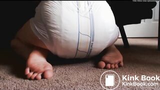 Releasing enema into diaper and showing the result