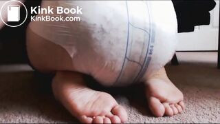 Releasing enema into diaper and showing the result