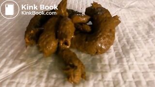 tattooed girl pulls out a big strip of poop