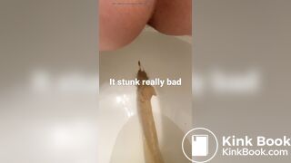 young long turd toilet