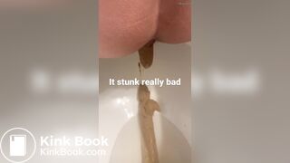 young long turd toilet