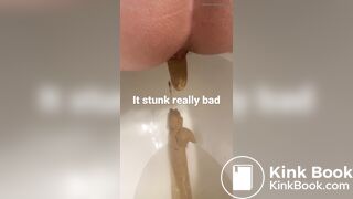 young long turd toilet