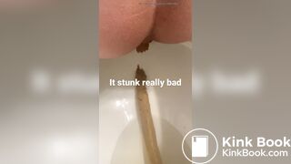 young long turd toilet