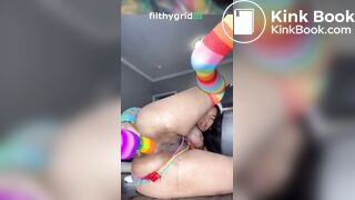 Latina fucks her ass with multicolour dildo (2)