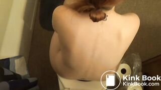 Hot Redhead girl pooping on toilet other view