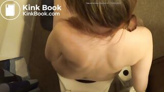 Hot Redhead girl pooping on toilet other view