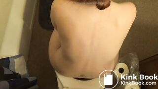 Hot Redhead girl pooping on toilet other view