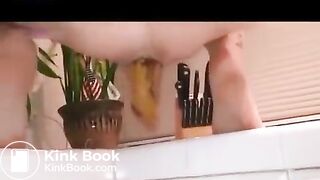 German scat lady playing in the kitchen..