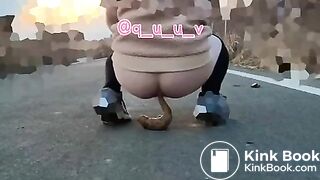 Japanese Twitter girl outside big long poop