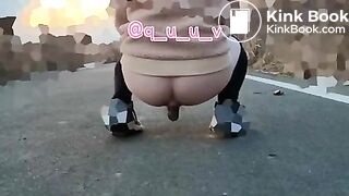 Japanese Twitter girl outside big long poop