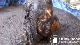 Thai girl taking a bath in cow shit.