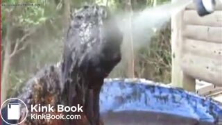 Thai girl taking a bath in cow shit.