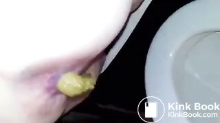 Girl takes a shit in the toilet