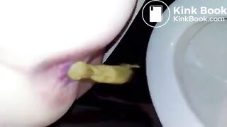 Girl takes a shit in the toilet